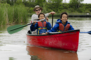 The Riviera twins enjoy a paddling lesson with Dave Pearce, of CPAWS Wildlands League, during "Paddling 101" at Rouge Beach Park, June 13, 2015.